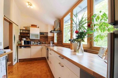 Schöne Maisonette-Wohnung mit Dachterrasse, Garten zur Alleinnutzung und Fernwärme