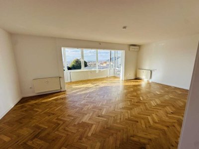 Exklusive 4-Zimmer-Wohnung mit EBK, Garten, Terrasse und Panoramablick im begehrten Musikerviertel