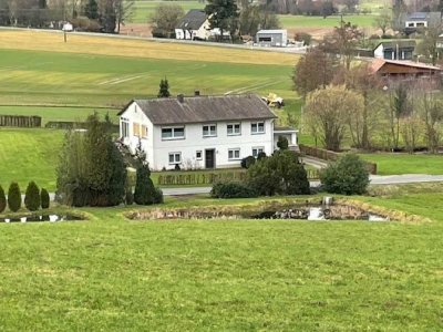 Einfamilienhaus mit Einliegerwohnung (auch nur als Einfamilienhaus nutzbar) in  landschaftlich