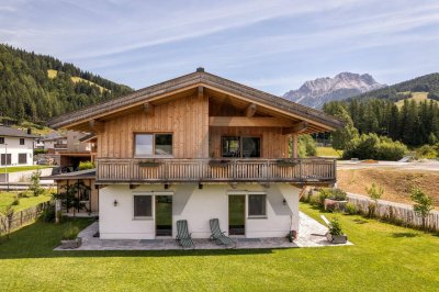 Traditionelles Einfamilienhaus mit Bergblick