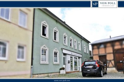 Vermietetes Einfamilienhaus mit Gewerbeeinheit