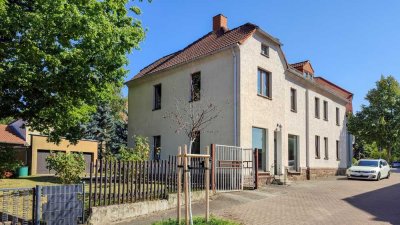 Gepflegtes Wohn- und Geschäftshaus mit vielen Gestaltungsmöglichkeiten, Kamin, Garagen & Garten