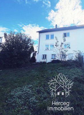 Familienfreundliches Zweifamilienreiheneckhaus mit traumhaften großen Garten *idyllische Lage*