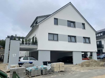 Geschmackvolle Wohnung mit viereinhalb Zimmern sowie großem Balkon und EBK in Münsingen