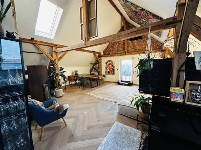 Einzigartige Loft-Wohnung mit Eigengarten direkt am Mühlbach: Stilvoll, exklusiv und ideal für Singles oder Paare!