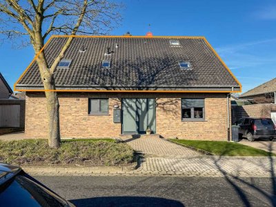 Charmante Dachgeschosswohnung in Zweifamilienhaus mit Balkon und Stellplätzen in Nütterden