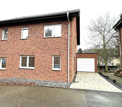 Erstbezug! Moderne Doppelhaushälfte mit Garage und Gartenbereich.