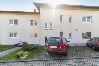 Ideale Kapitalanlage: Erdgeschosswohnung mit eigenem Gartenanteil und Stellplatz