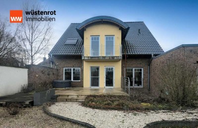 Stilvolles Einfamilienhaus mit großzügigem Garten und Einliegerwohnung