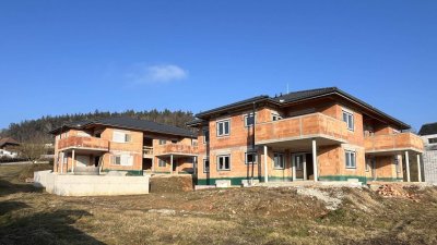 Neubauwohnung mit sonniger Terrasse und Eigengarten