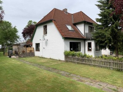 Schöne 3 Zi DG Whg mit großem Garten und Terrasse