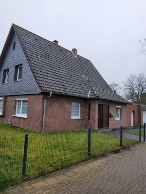 Einfamilienhaus mit Garten, Garage und Keller, zentral in ruhiger Wohnlage