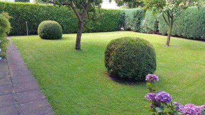 Außergewöhnliche DG Wohnung mit großem Gartenanteil