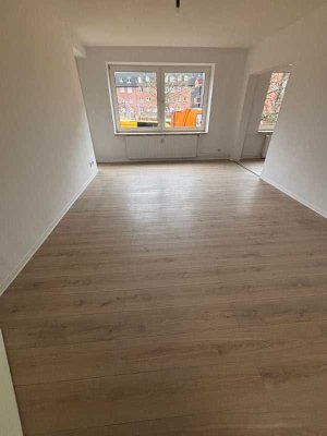 Mitten im Herzen von Neumünster, sanierte 2 Zimmer Wohnung