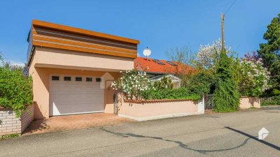 Großzügige 4-Zimmer-Wohnung mit Balkon, Garage mit Dachterrasse, in schöner Lage