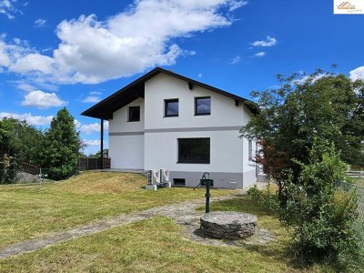 Zweifamilienhaus mit weitläufigem Garten