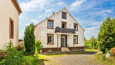 Mehrfamilienhaus mit vier Wohneinheiten, großem Garten und viel Potenzial