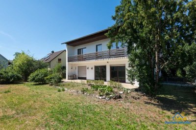 Ruhig gelegenes Ein-/Zweifamilienhaus mit idyllischem Garten und Garage