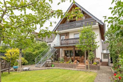 **Ein Haus mit Charme** und mit wunderschönem Garten in attraktiver Lage von Bergisch Gladbach