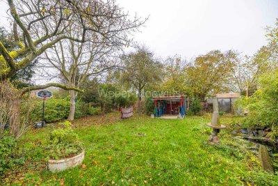 2 Wohneinheiten mit Terrasse, Stellplätzen und wunderschönem Garten in ruhigem Wohngebiet