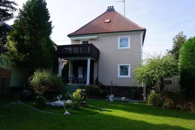 Gemütliches Einfamilienwohnhaus mit gepflegtem Garten