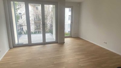 Top Lage! Erstbezug! Möblierte Balkonwohnung mit TG- Stellplatz