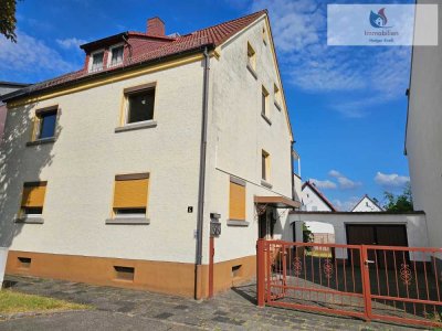 Zweifamilienhaus mit Ausbaupotenzial, Garten, Keller, Garage und viel Platz in Hanau Klein-Auheim