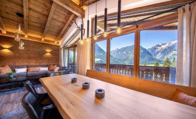 Attraktives Ferienimmobilien-Investment: Exklusives Nationalpark-Chalet mit traumhaftem Bergpanorama und Ski-In/Ski-Out Erlebnis