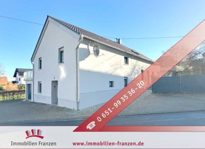 Schillingen: Saniertes Ein- bis Zweifamilienhaus mit großer Garage und schönem Garten!