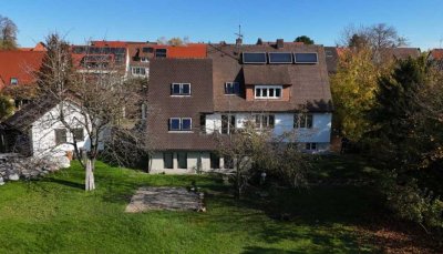 GROSSZÜGIGES ZWEIFAMILIENWOHNHAUS
MIT GROSSEM GARTEN IN
BELIEBTER LAGE