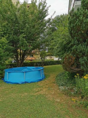 Gut vermietete 4 Zimmer-Wohnung mit Balkon und großem Gartenanteil !