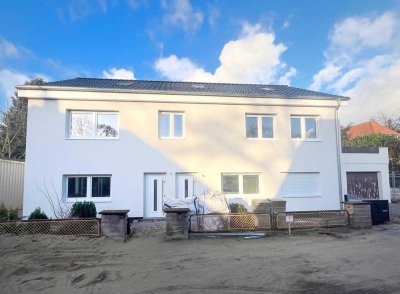 Energetisch kernsanierte OG Wohnung, Luftwärmepumpe, Garage und Dachterrasse