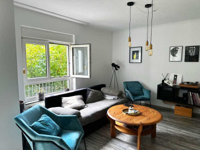 Helle 2 Zimmer Wohnung mit Terrasse und Garten in Süd-Ausrichtung