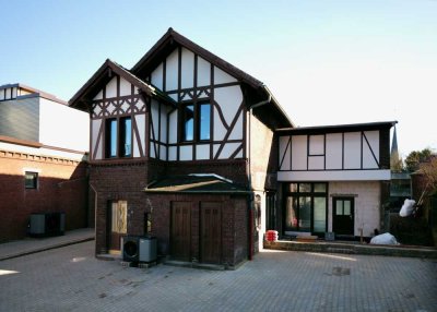 Wohnen im ehemaligen Kutscherhaus mit sonnigem Balkon