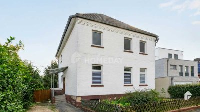 Freiwerdendes Zweifamilienhaus mit besonderer Architektur in ruhiger Lage – sofort bezugsbereit