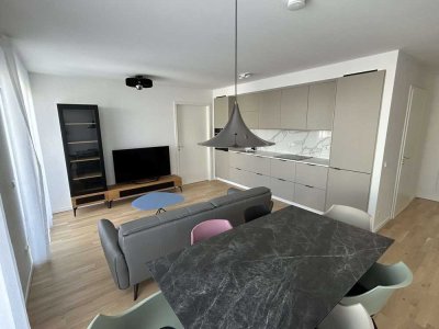 Neubau-Erstbezug // 3-Zimmer Wohnung mit Einbauküche + Balkon + Einbauschränken etc.