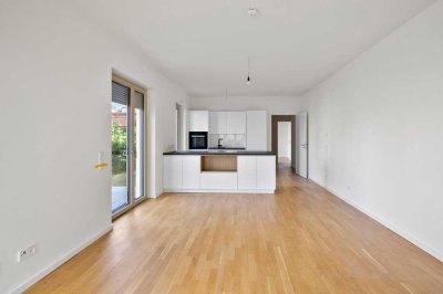 Moderne, geräumige und helle 2-Zimmer-Wohnung mit EBK, Garten & Terrasse nahe Volkspark. Erstbezug!