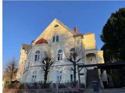 Mehrfamilienhaus im Villenstil mit Garten in Top-Lage und Geschäftsräumen im Untergeschoss