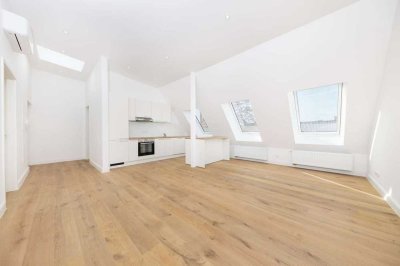 Lichtdurchflutete Dachgeschosswohnung in saniertem Altbau-Juwel mit Effizienzklasse A