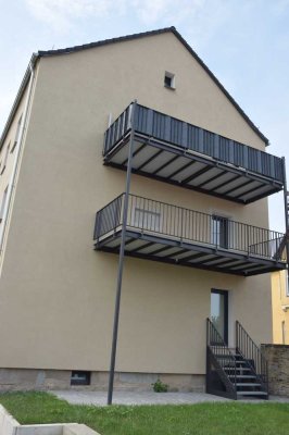 Erstbezug nach Sanierung mit Balkon: Freundliche 3-Zimmer-Wohnung mit geh. Innenausstattung