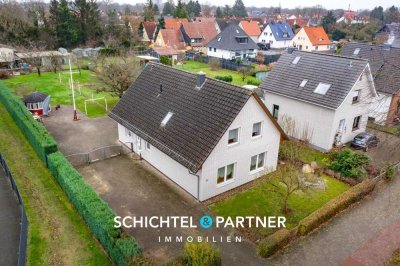 Kattenesch | Modernes Einfamilienhaus mit großem Garten und Doppelgarage