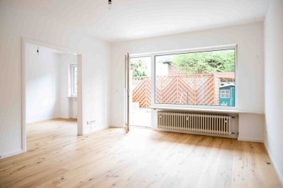 Helle 3 Zimmer EG-Wohnung mit Terrasse und kleinem Garten im Süden von München