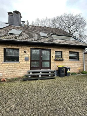 Traumhaftes Einfamilienhaus in Baerl mit großzügigem Garten und gehobener Ausstattung in bester Lage