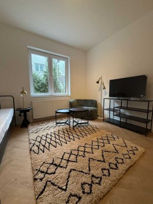 Exklusive 1-Zimmer-Wohnung mit hochwertiger Möblierung & Design-Küche