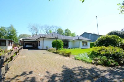 Großzügiger Winkelbungalow in ruhiger Wohnlage mit Ausbaureserve und gepflegtem Garten