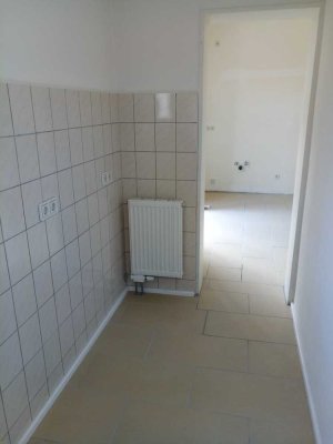 Attraktive 4-Zimmer-Erdgeschosswohnung mit geh. Innenausstattung mit Balkon