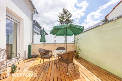 Hochwertig sanierte Eigentumswohnung mit drei Zimmern und großer Dachterrasse