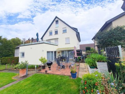 Dreifamilienhaus mit großzügigem Garten und Doppelgarage