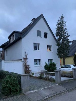 Freistehendes Dreifamilienhaus in Köln Rodenkirchen mit Garten