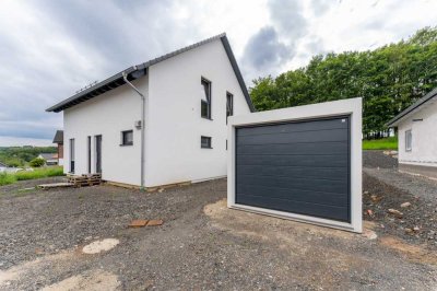 Wohnen, wo andere Urlaub machen: Neubau - freistehendes Einfamilienhaus in idyllischer Wohnlage!